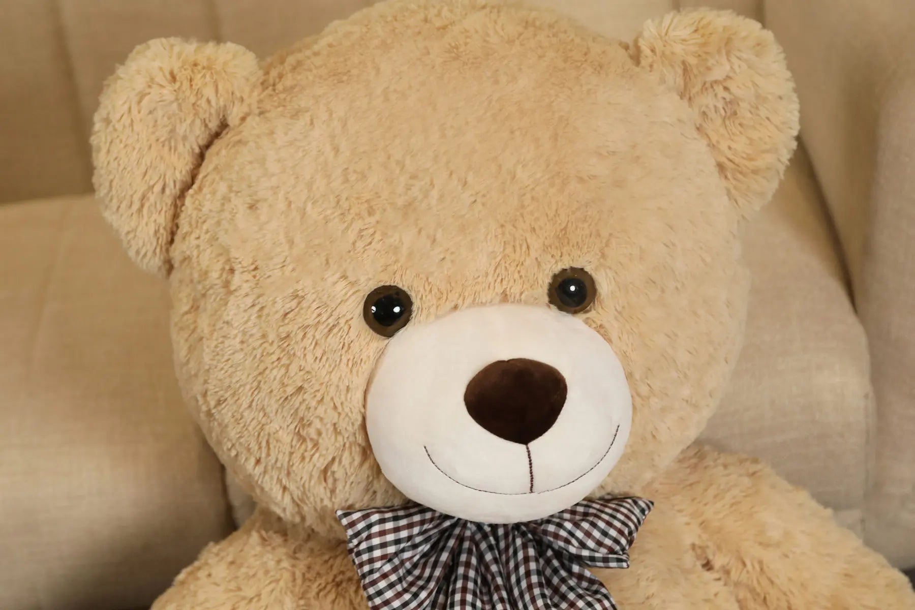Ours en peluche Géant Noeud