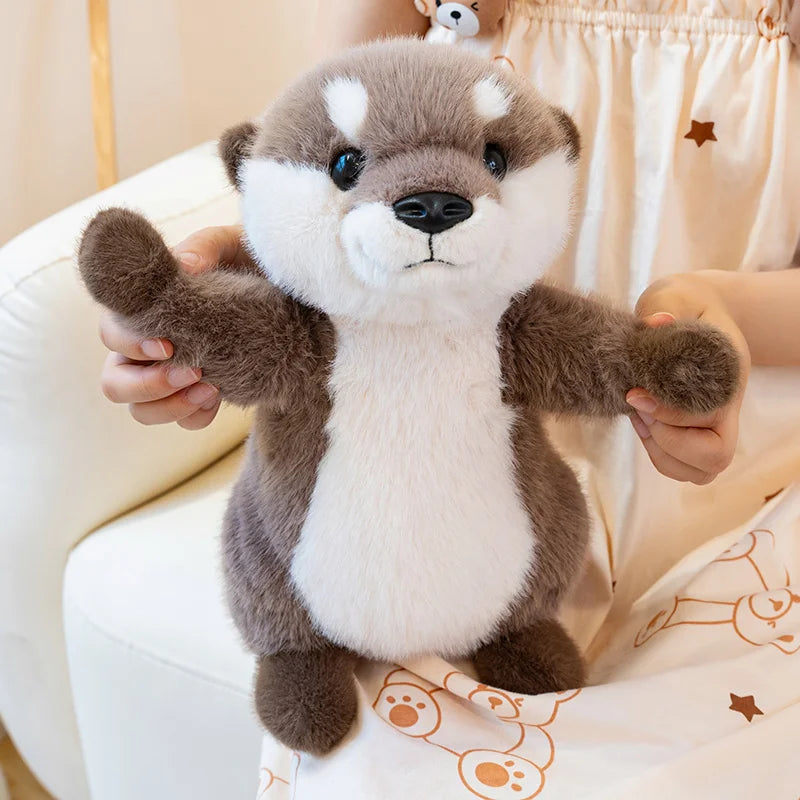 Peluche loutre mains magnétique