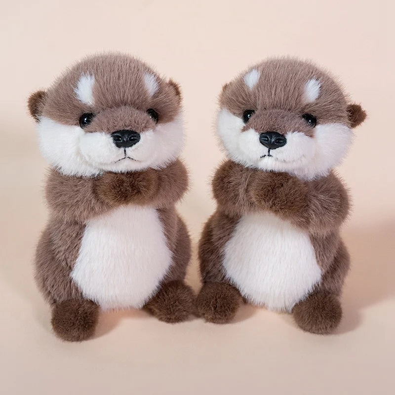 Peluche loutre mains magnétique