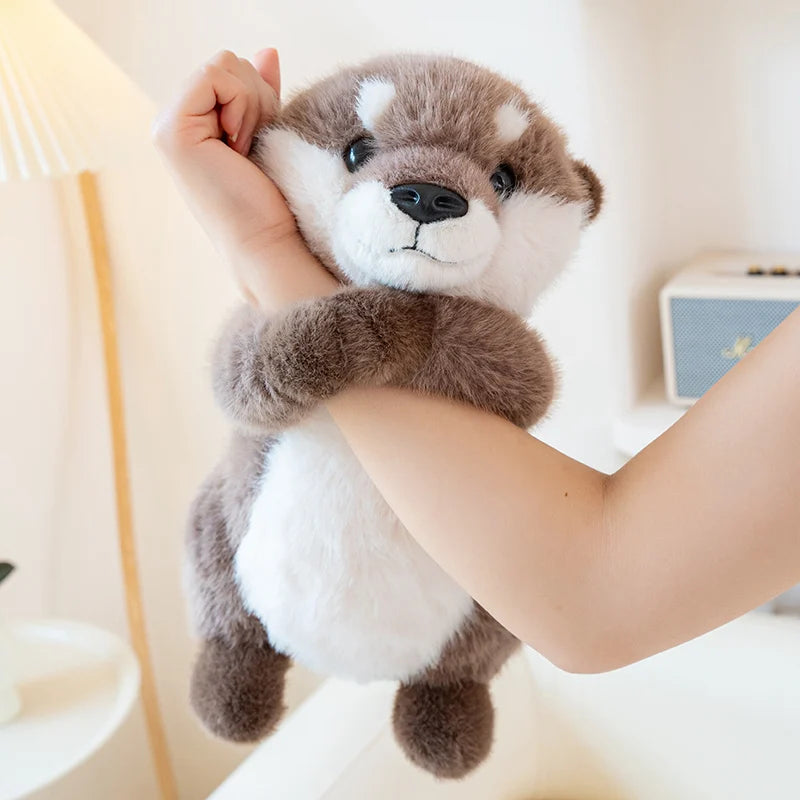 Peluche loutre mains magnétique
