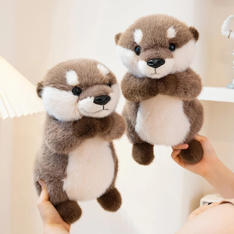 Peluche loutre mains magnétique