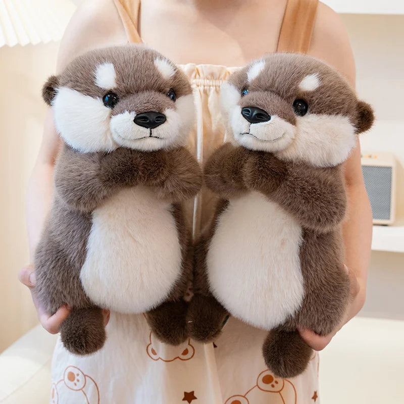 Peluche loutre mains magnétique