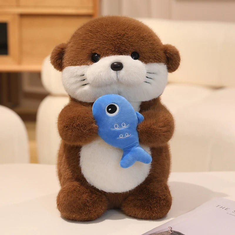 Peluche loutre poisson