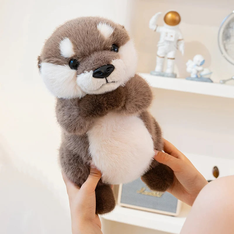 Peluche loutre mains magnétique